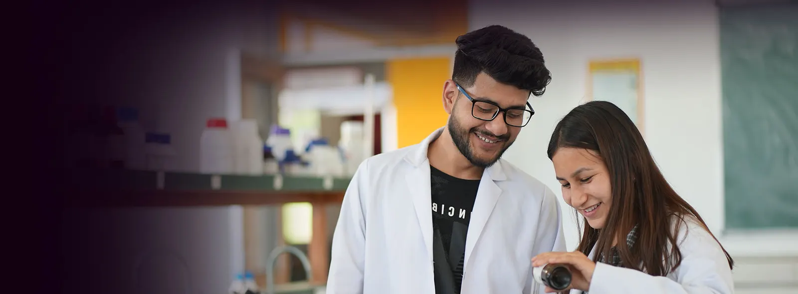 Students working in a laboratory at Shoolini University