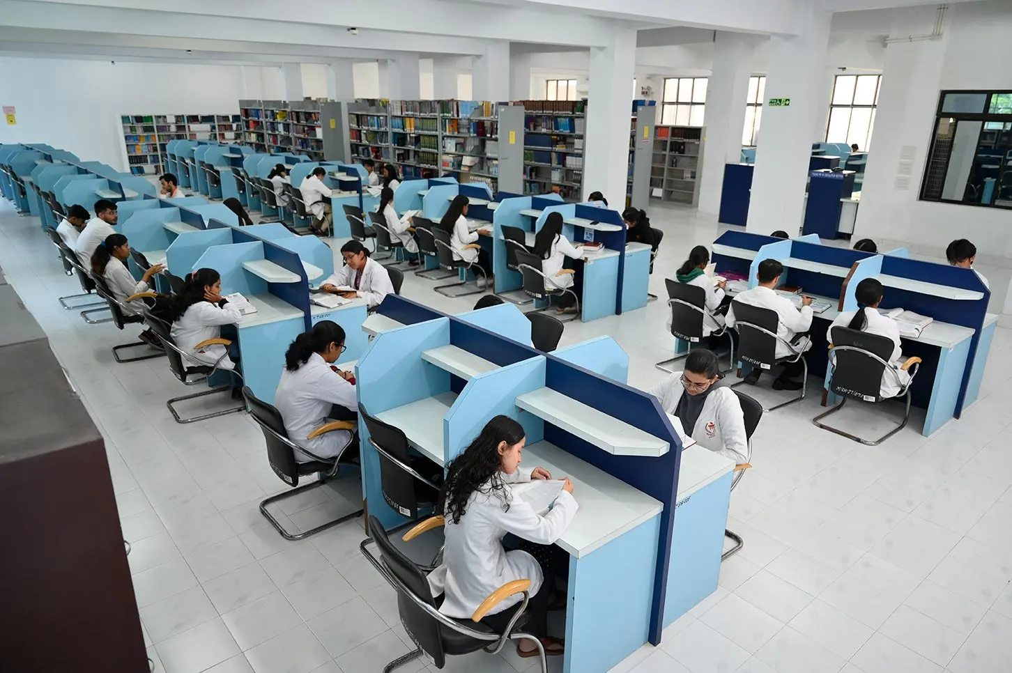 Medical students studying in the library at Sikkim Manipal University